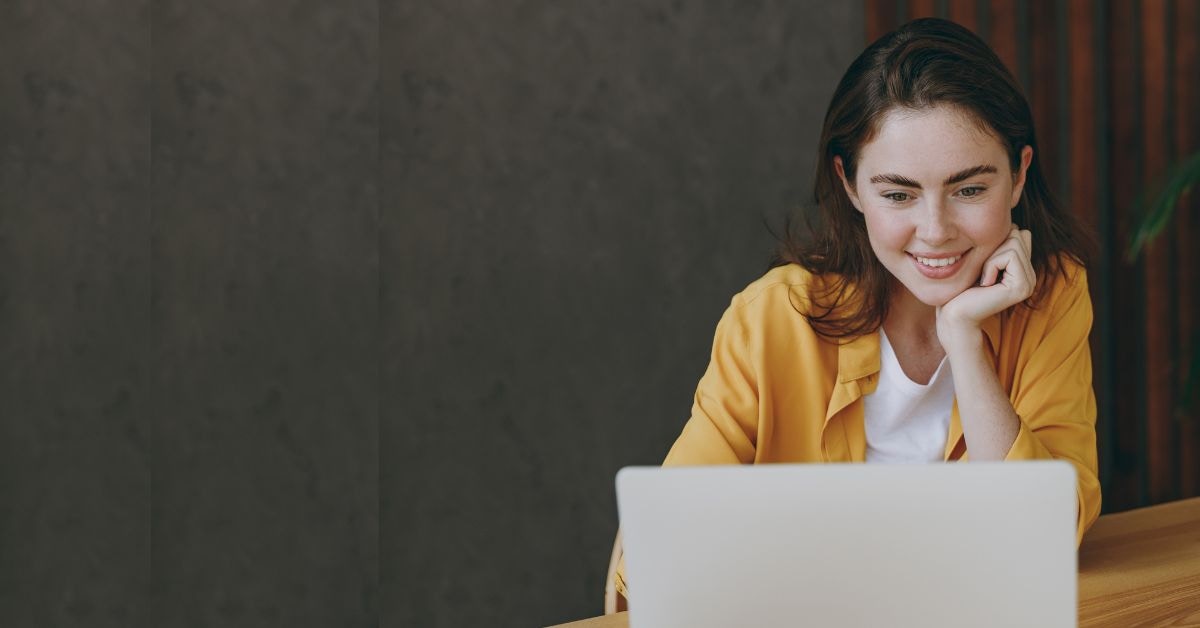 Woman looking at her laptop