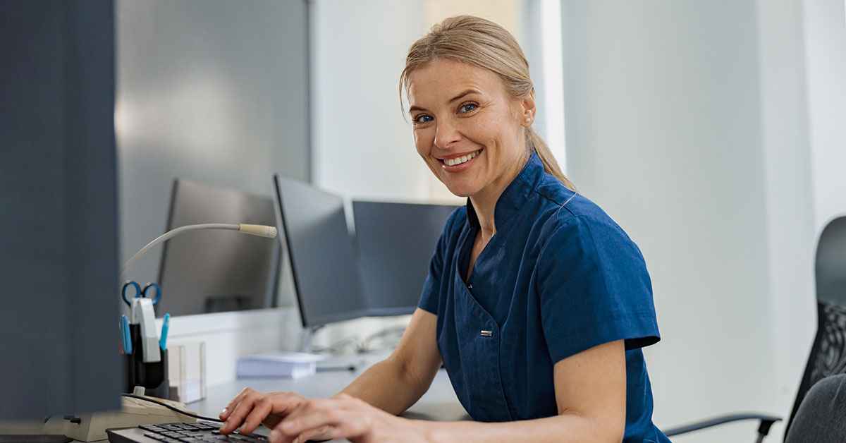 Receptionist working on computer