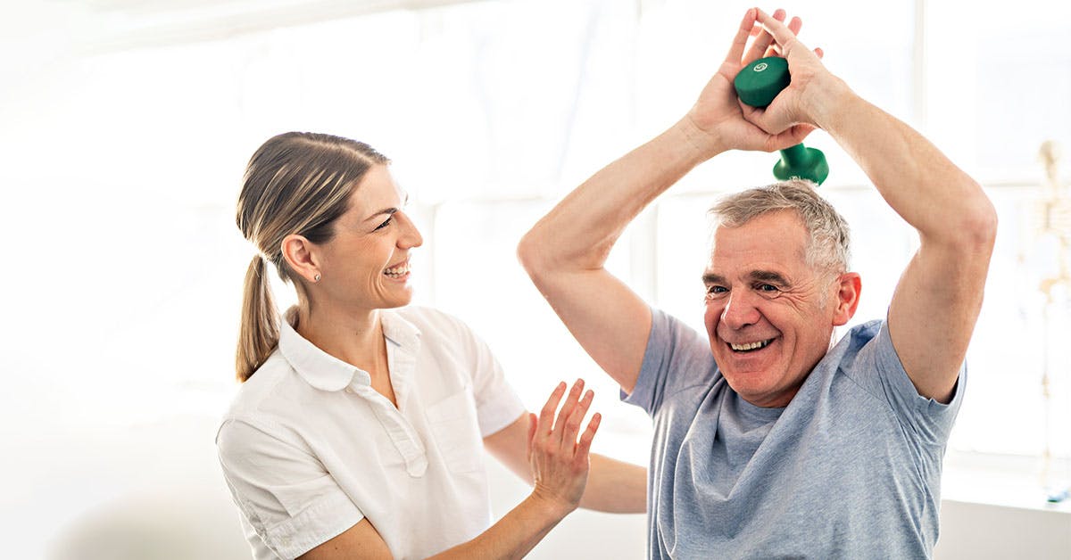 physiotherapist with patient