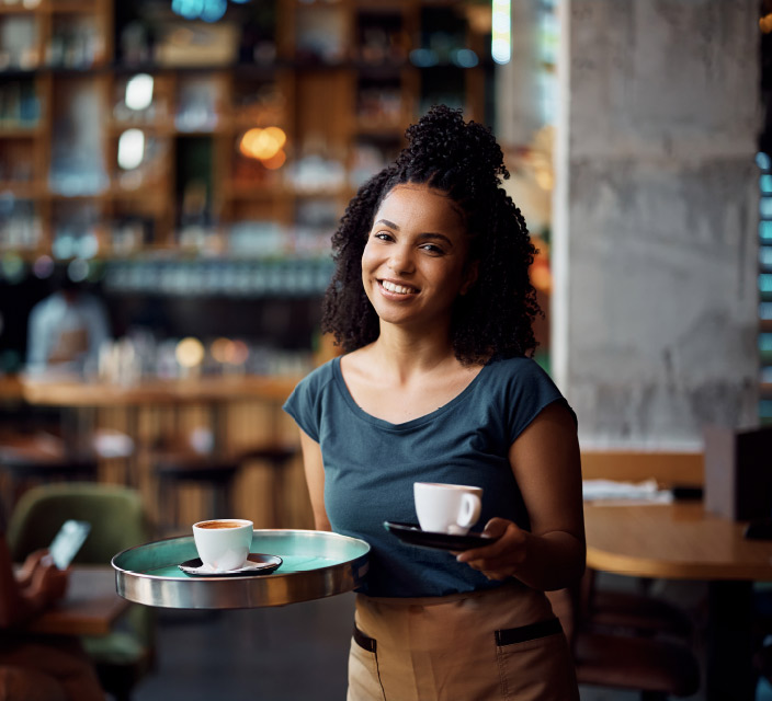 woman serving coffee