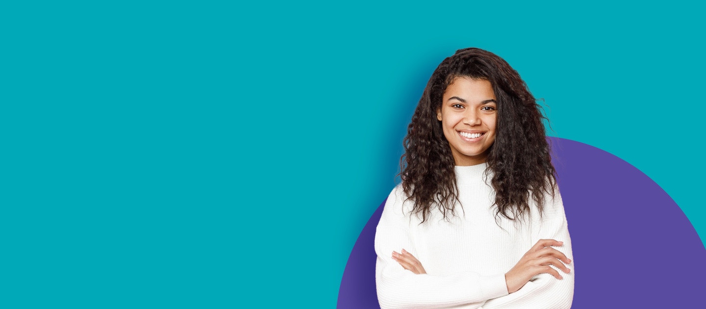 Young woman with curly hair smiling