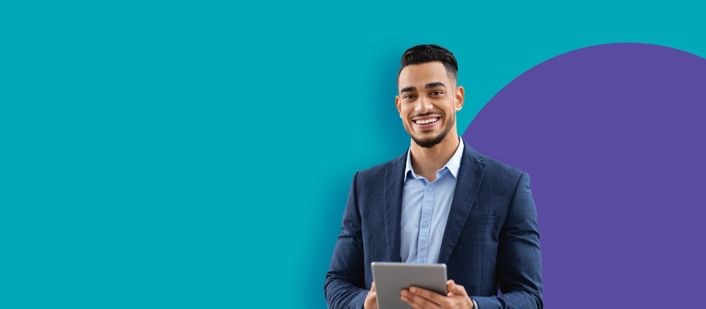 Man in suit with tablet