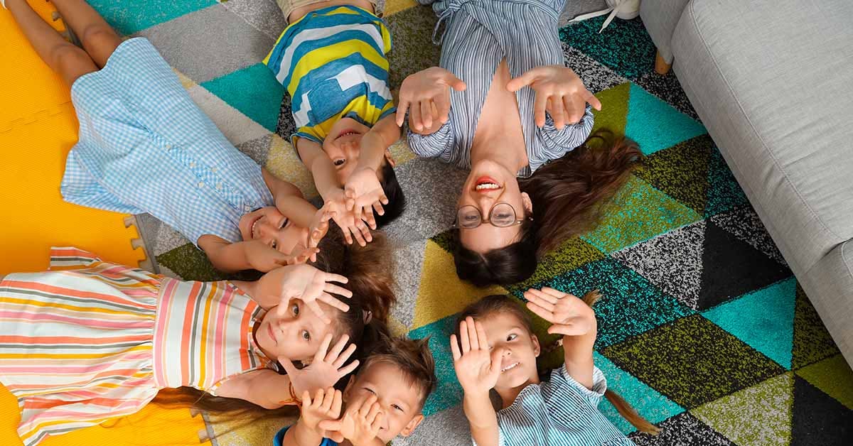 Kids high fiving in the air