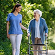 Woman on a walk with elderly woman