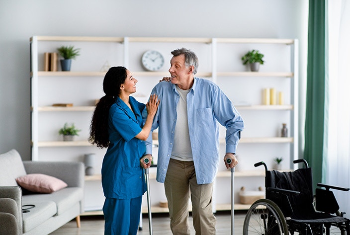 Disability support worker assisting client