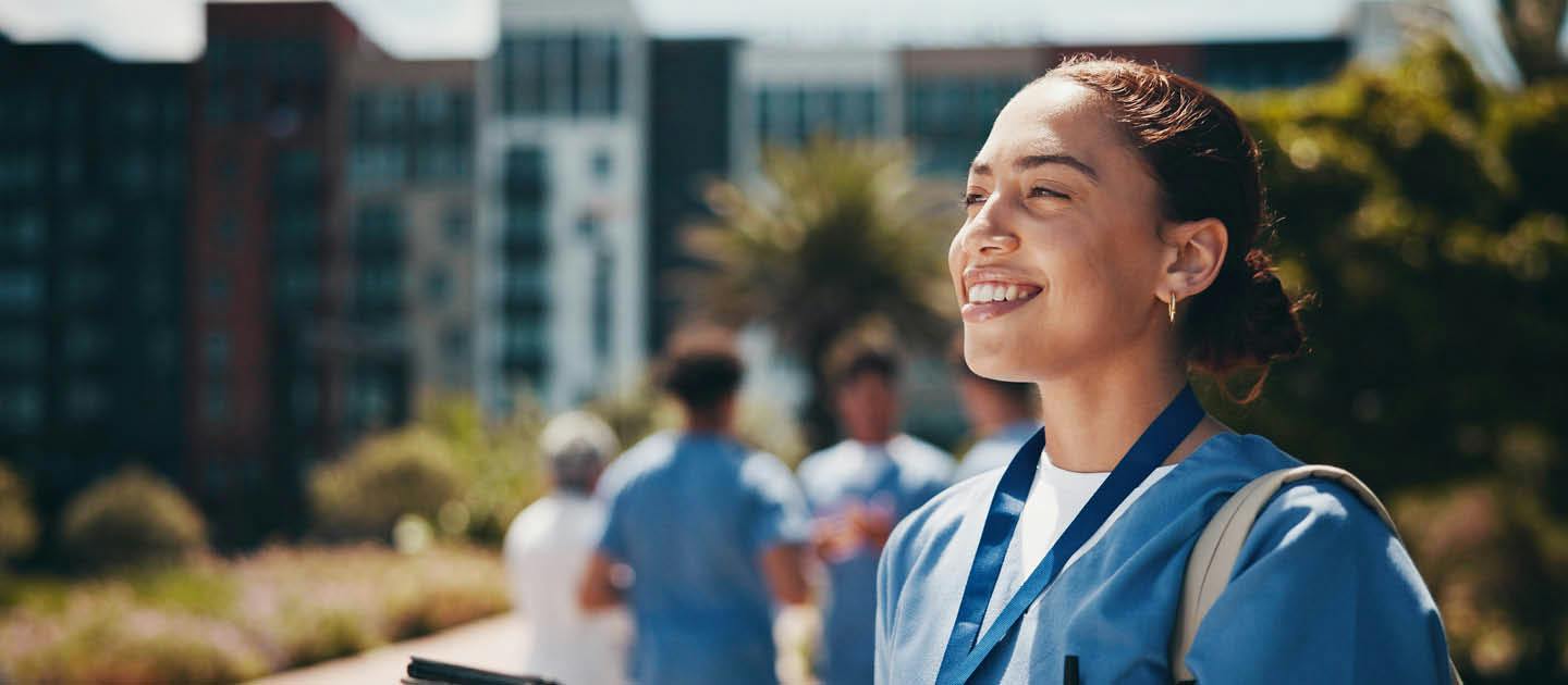 Healthcare student or support worker outside a training facility
