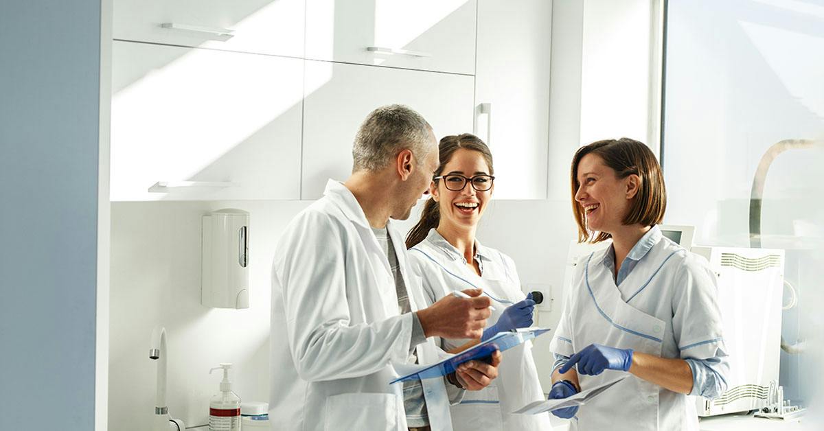Dental professionals working together in a dental clinic