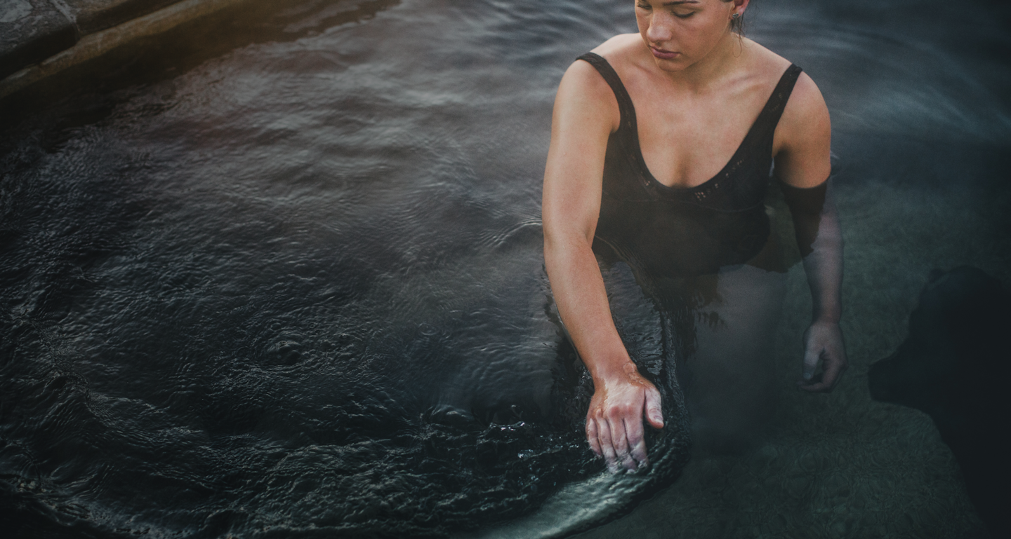 lady moving water with her hands
