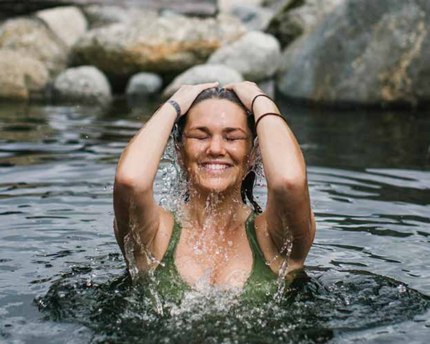 woman bathing at maruia hot springs