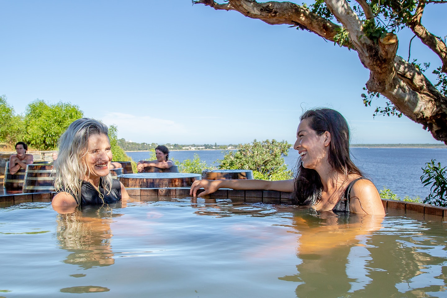 women bathing in pool at metung hot springs