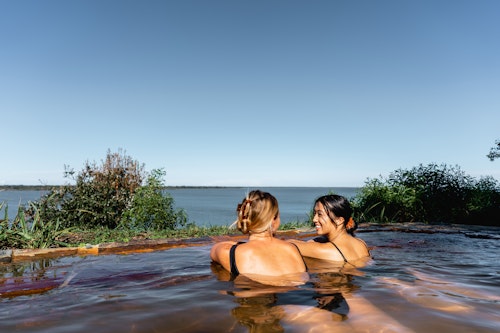 metung hot springs two friends bathing gippsland lakes