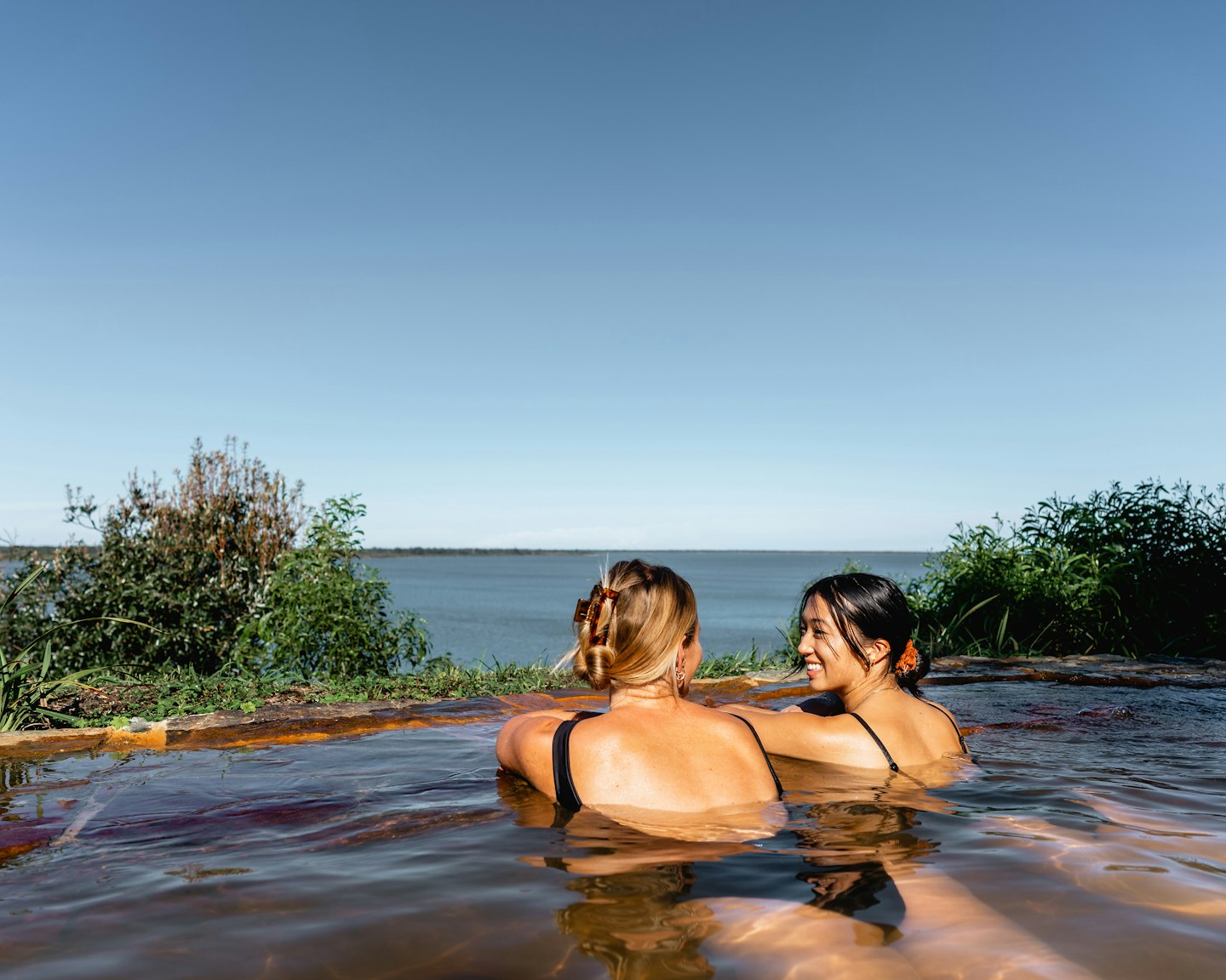 metung hot springs two friends bathing gippsland lakes