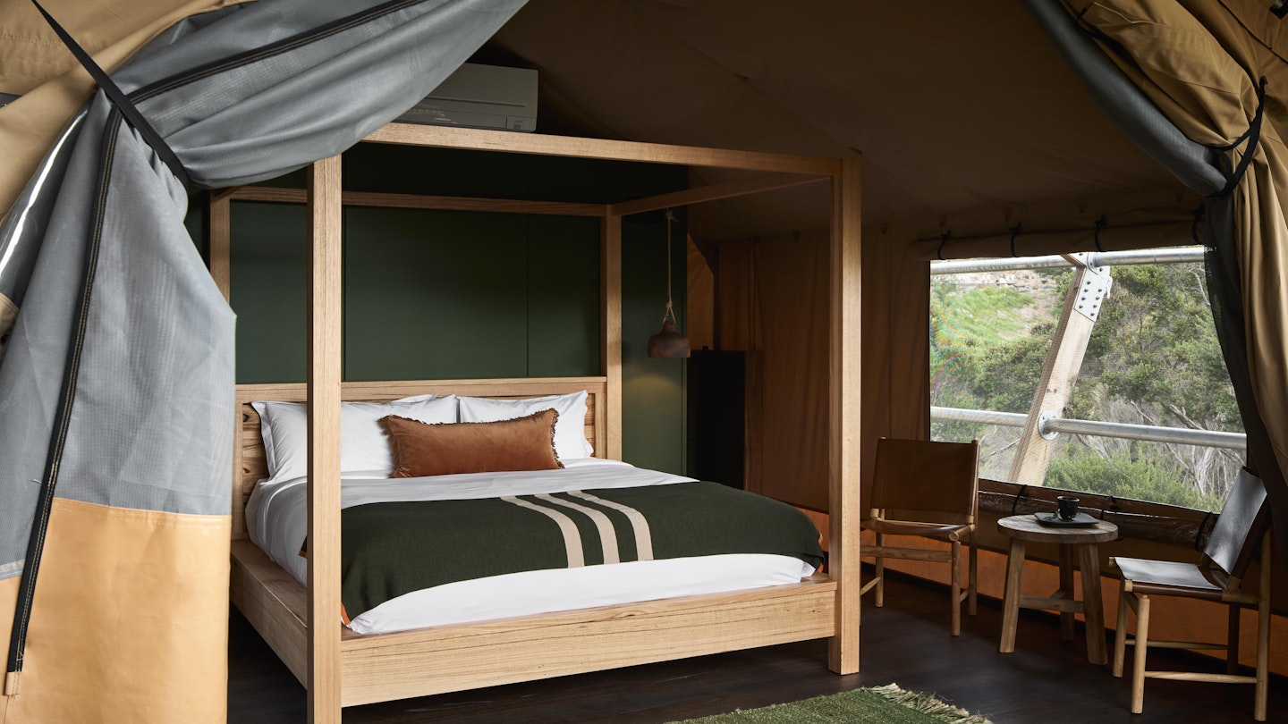 luxurious safari style glamping tent with king bed