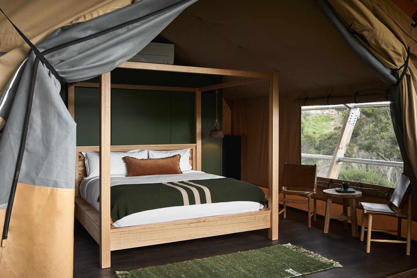 luxurious safari style glamping tent with king bed
