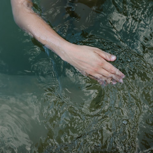 hand moving through water
