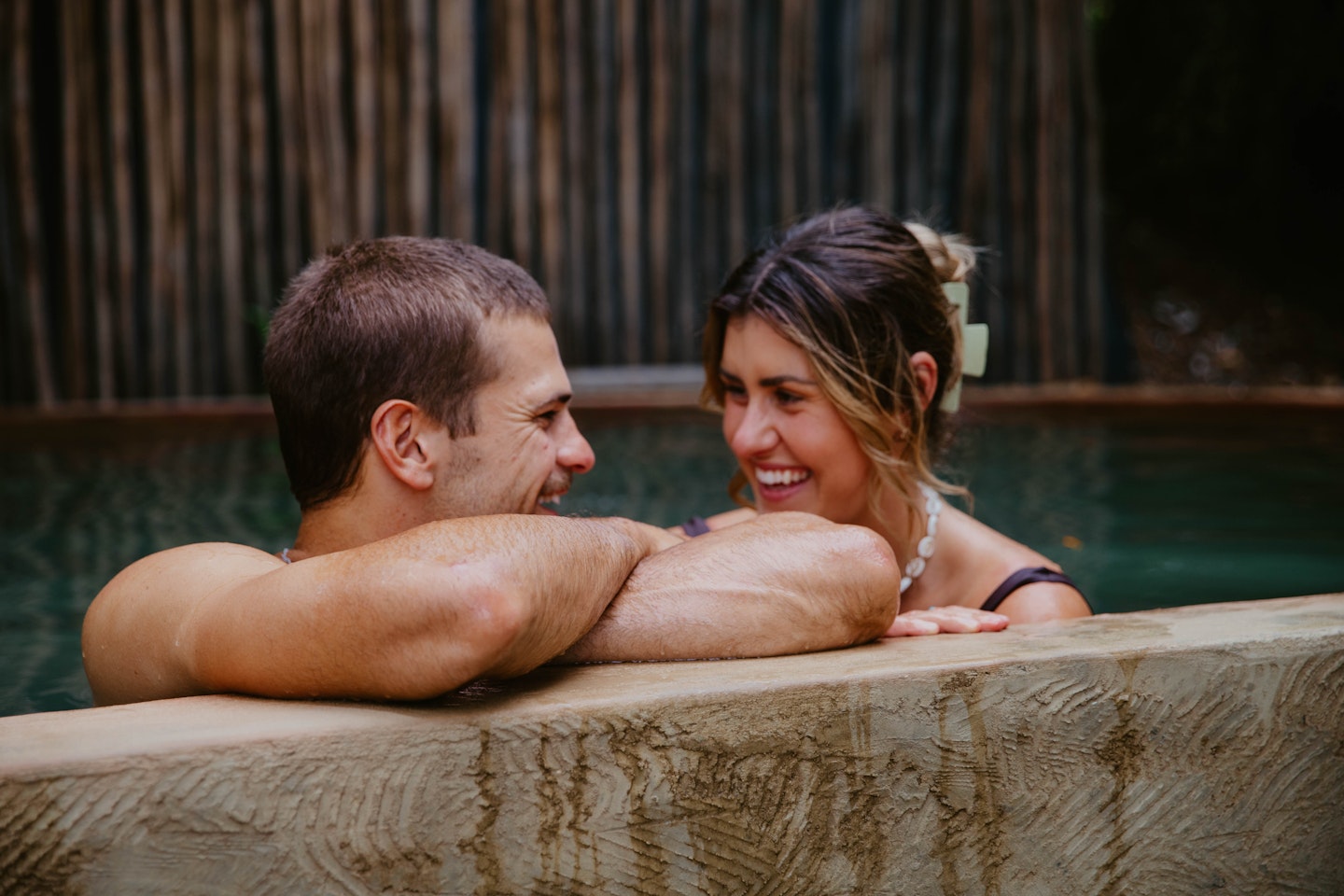 couple bathing in metung hot springs wombat pool