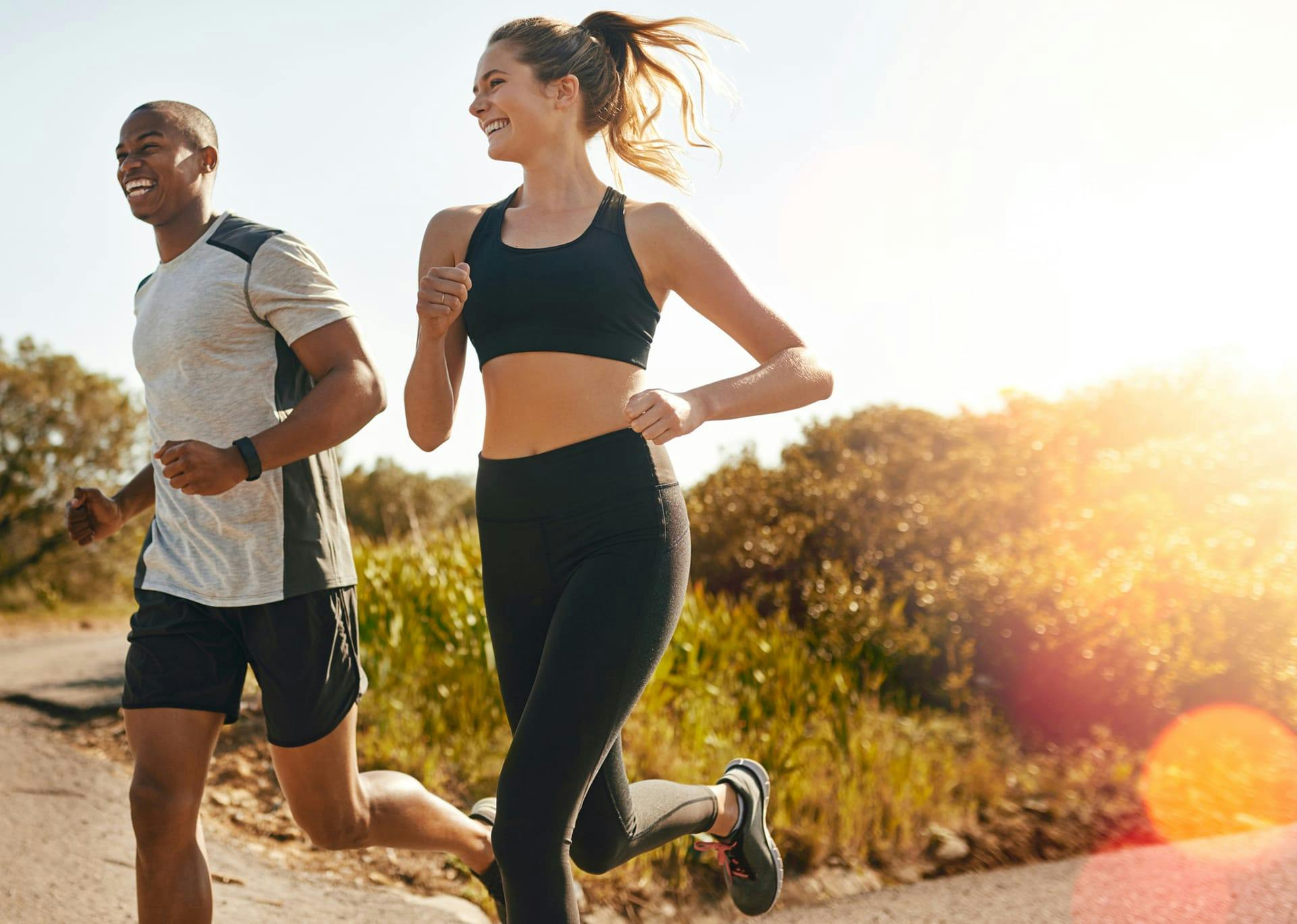 Man and woman jogging together highlighting joint injections in Southlake.