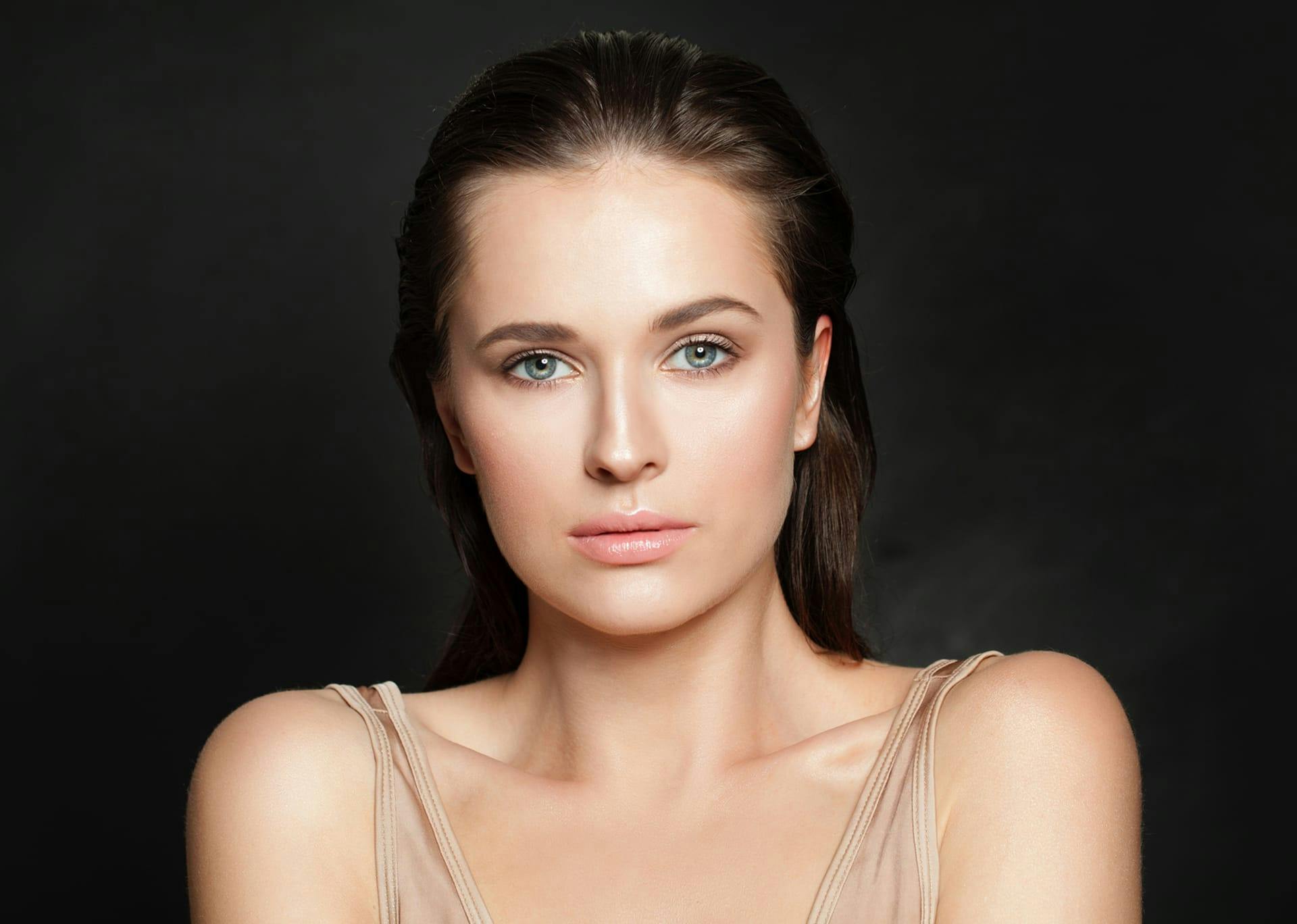 Woman with bright eyes and glowing skin