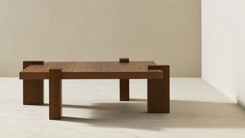 https://www.datocms-assets.com/73087/1670835971-hug-table-mahogany-classic_1.jpg