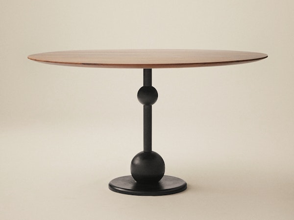 https://www.datocms-assets.com/73087/1674212082-images-2021_eight-table-dining-walnut.jpg