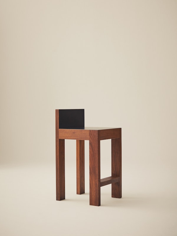 https://www.datocms-assets.com/73087/1674212716-images-2021_strict-bar-stool-walnut.jpg