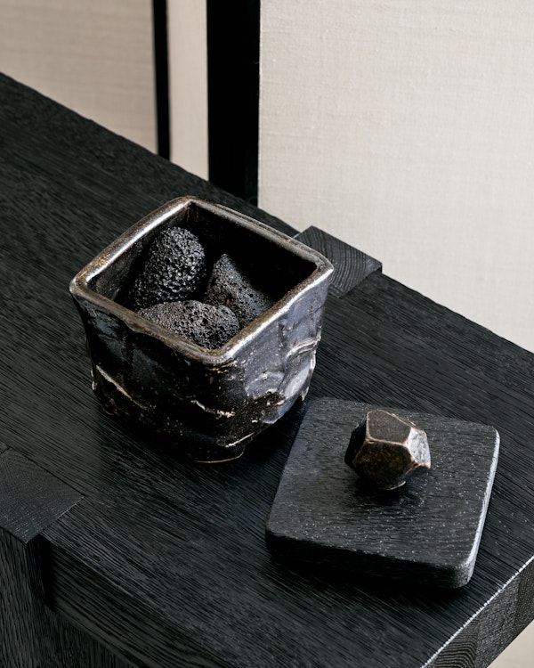 https://www.datocms-assets.com/73087/1749027674-sculpted-ceramic-box-lava-stones.jpg