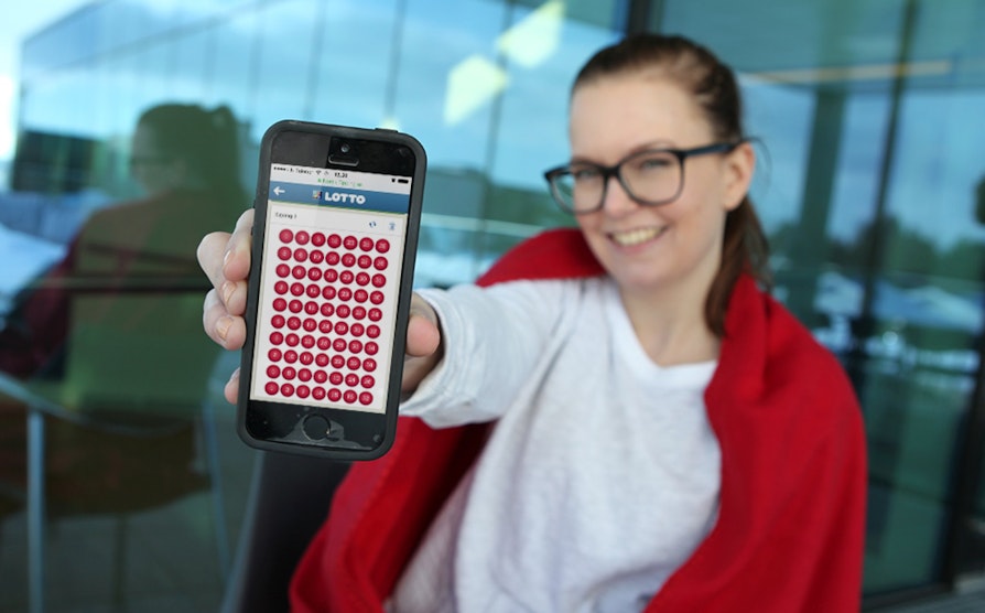 Lotto, Cathrine med Lotto på mobil
