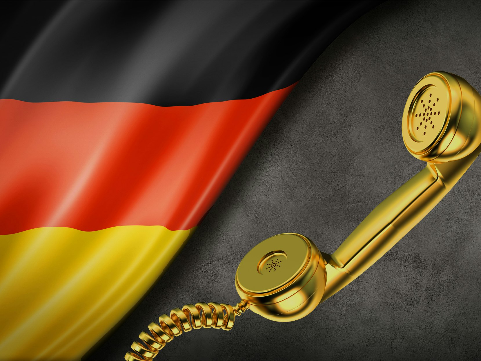 Det tyske flagget og en gulltelefon over sort bakgrunn