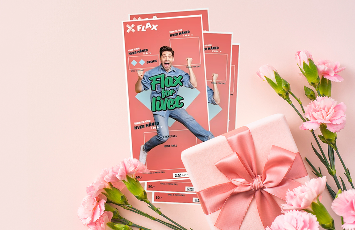 Fire Flax for Livet-lodd på rosa bakgrunn dandert med rosa gave med sløyfebånd og rosa  nellik-blomster