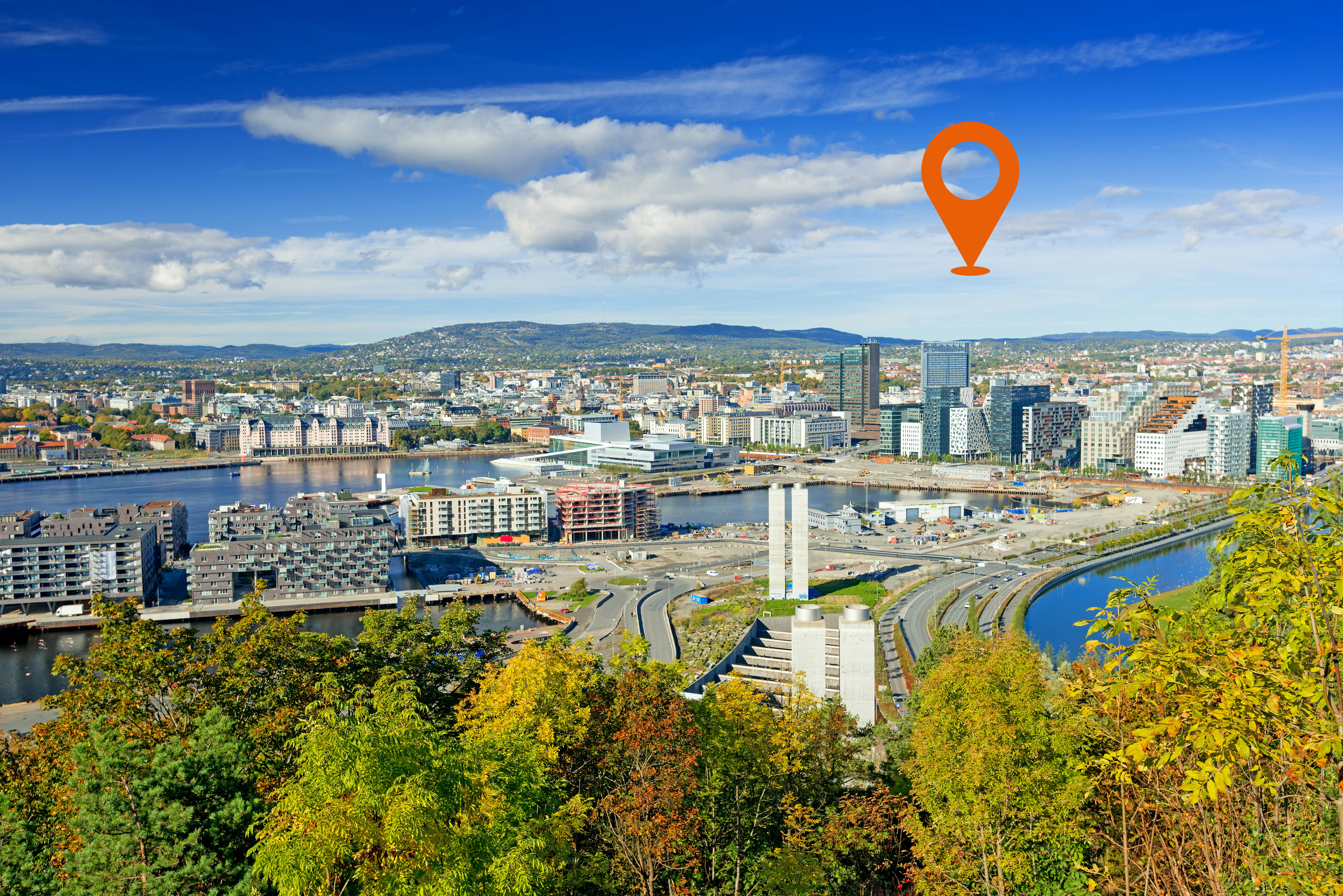Bilde av utsikt over Bjørvika i Oslo på sommeren.