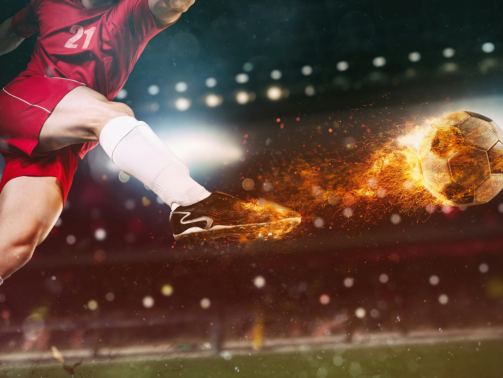 Bildeillustrasjon av en fotballspiller som skyter en ball - som tar fyr.