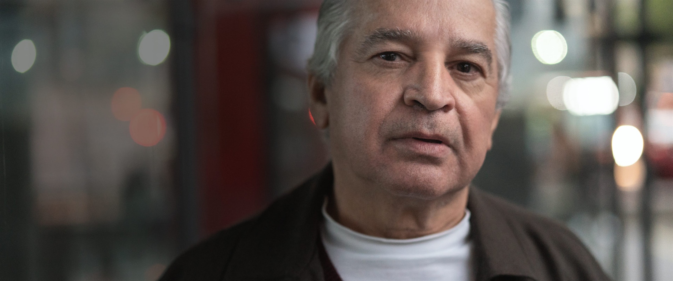 Average elderly man looking at the camera