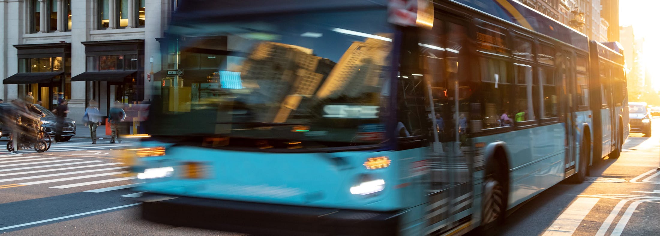 bus driving by on the street