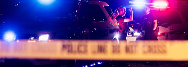 Car accident scene with police caution tape up