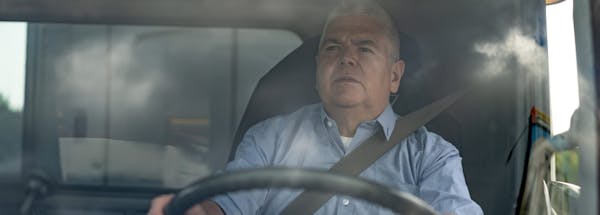 Truck driver with a concerned face