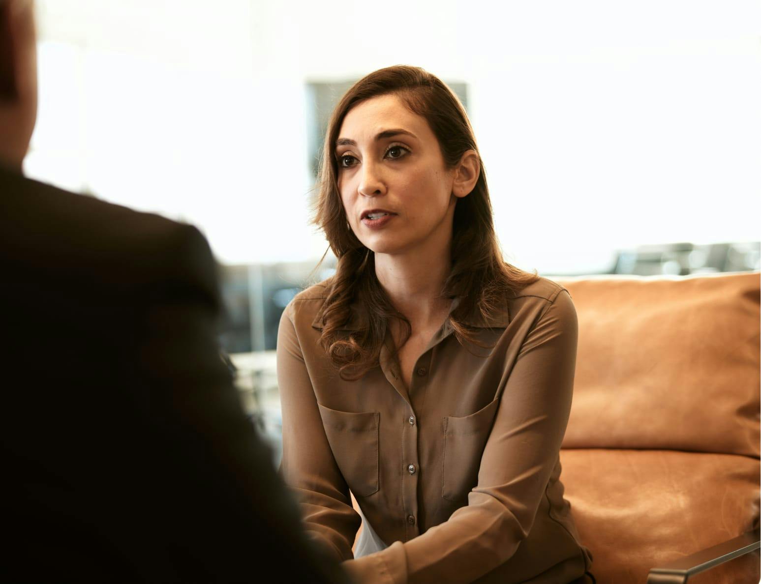 A client being helped by her lawyer, Ben Swanson.