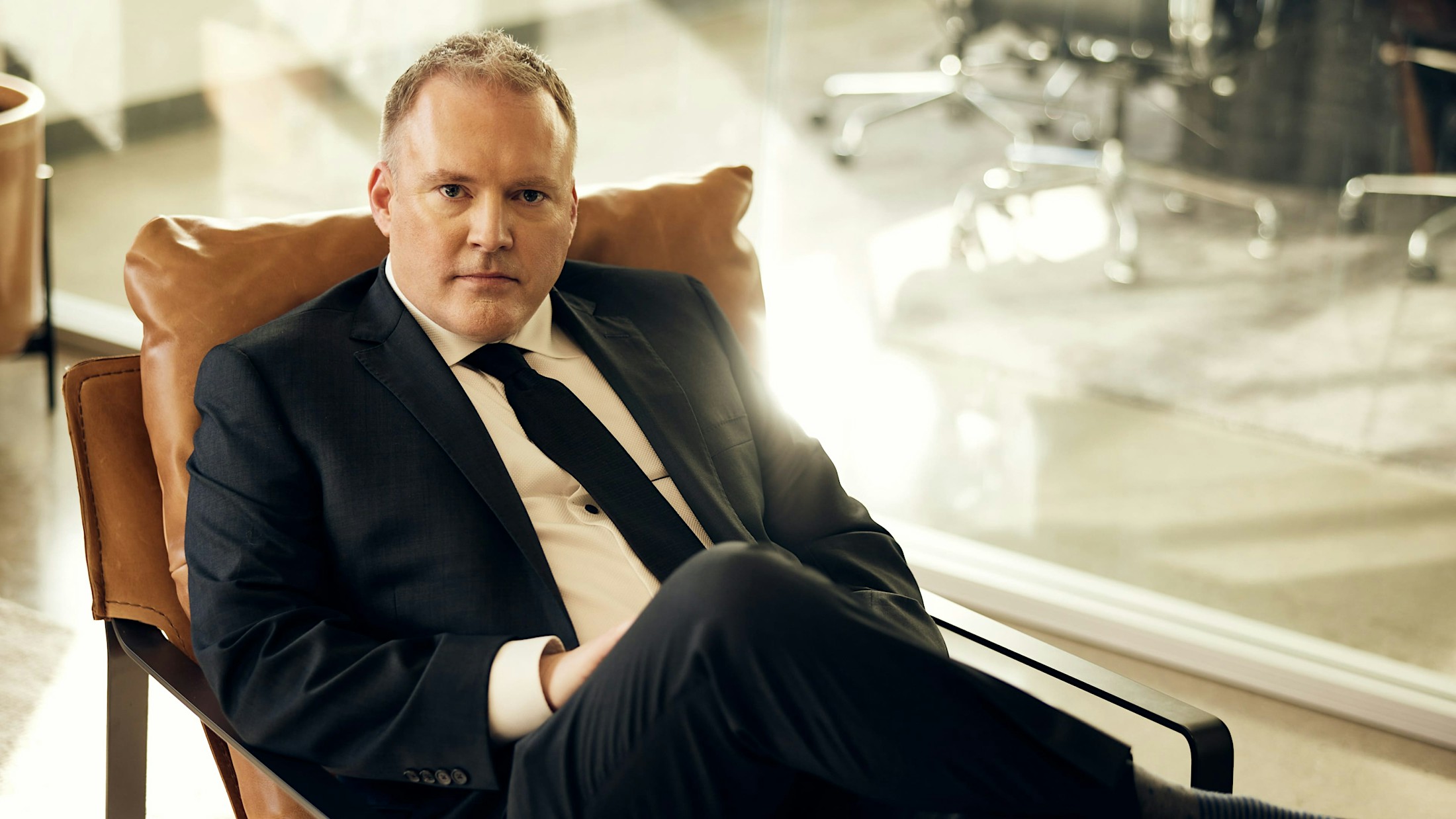 Ben Swanson sitting in his office.