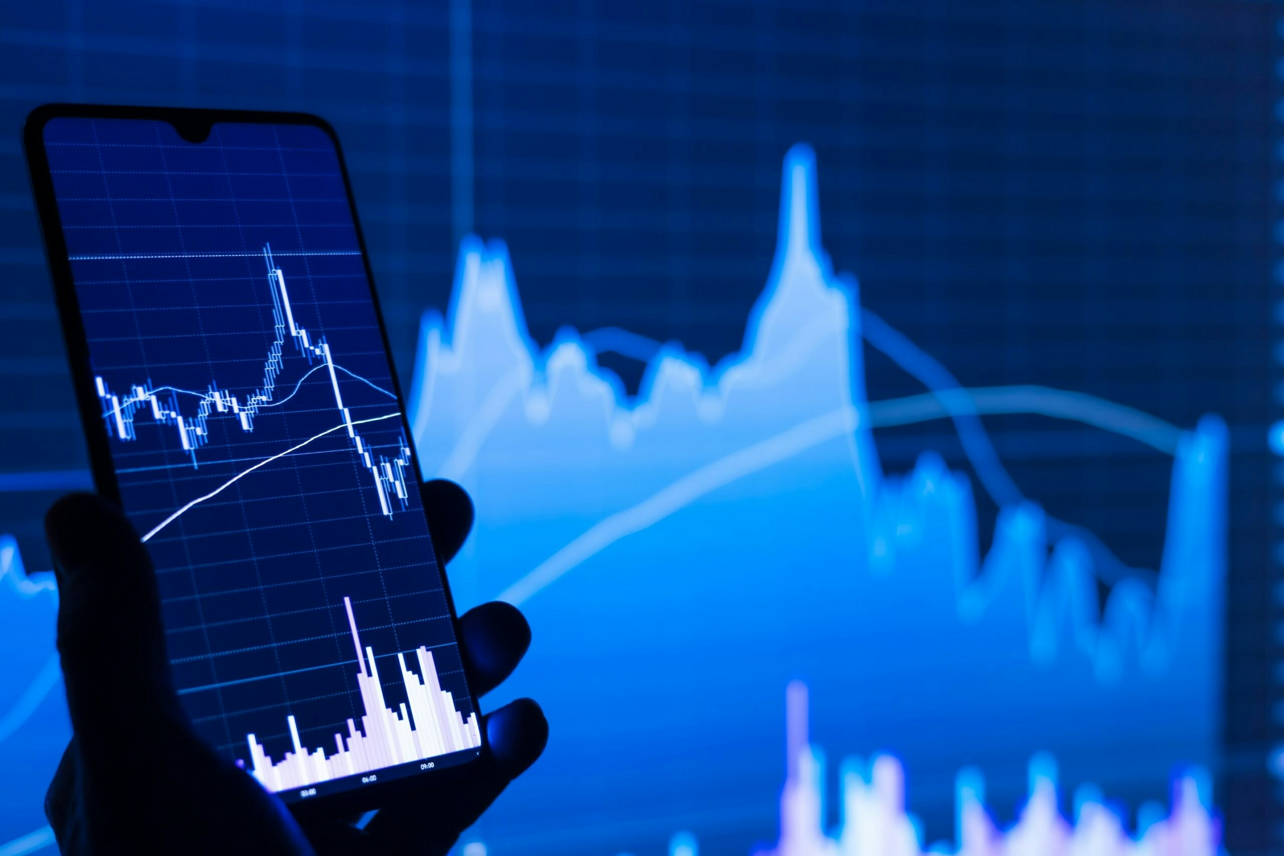 adam-smigielski-K5mPtONmpHM-unsplash Image of stock market correction in a graph.
