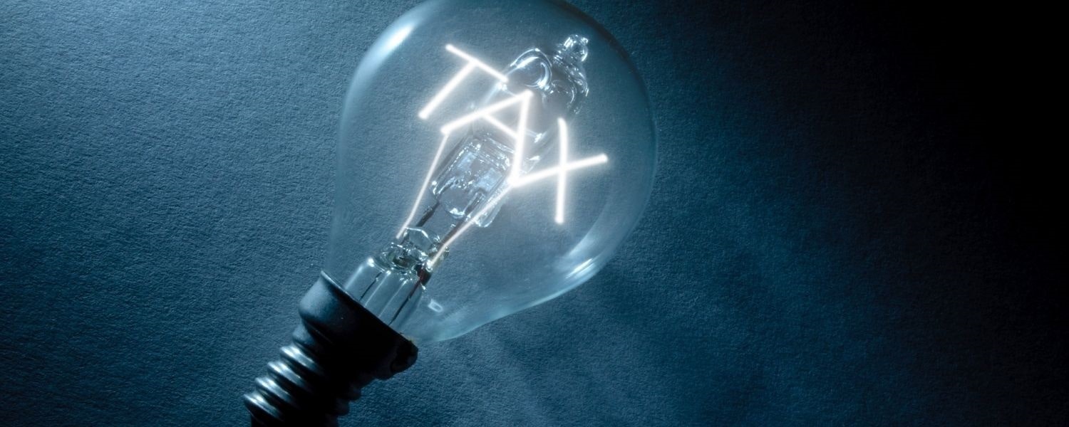 Tax Lightbulb Tax written in a lightbulb