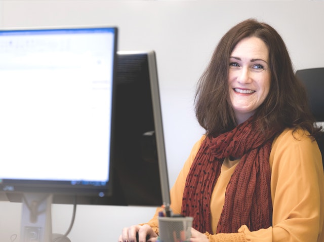 NetClean employee at desk