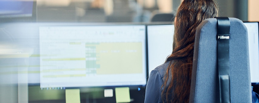 Woman in front of work station