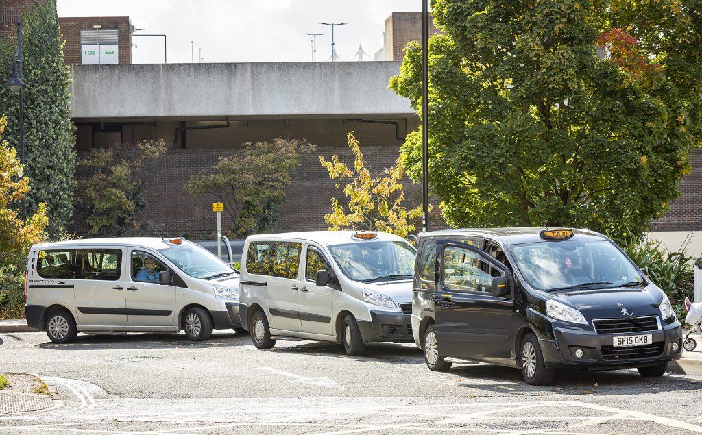 Three taxis lined up