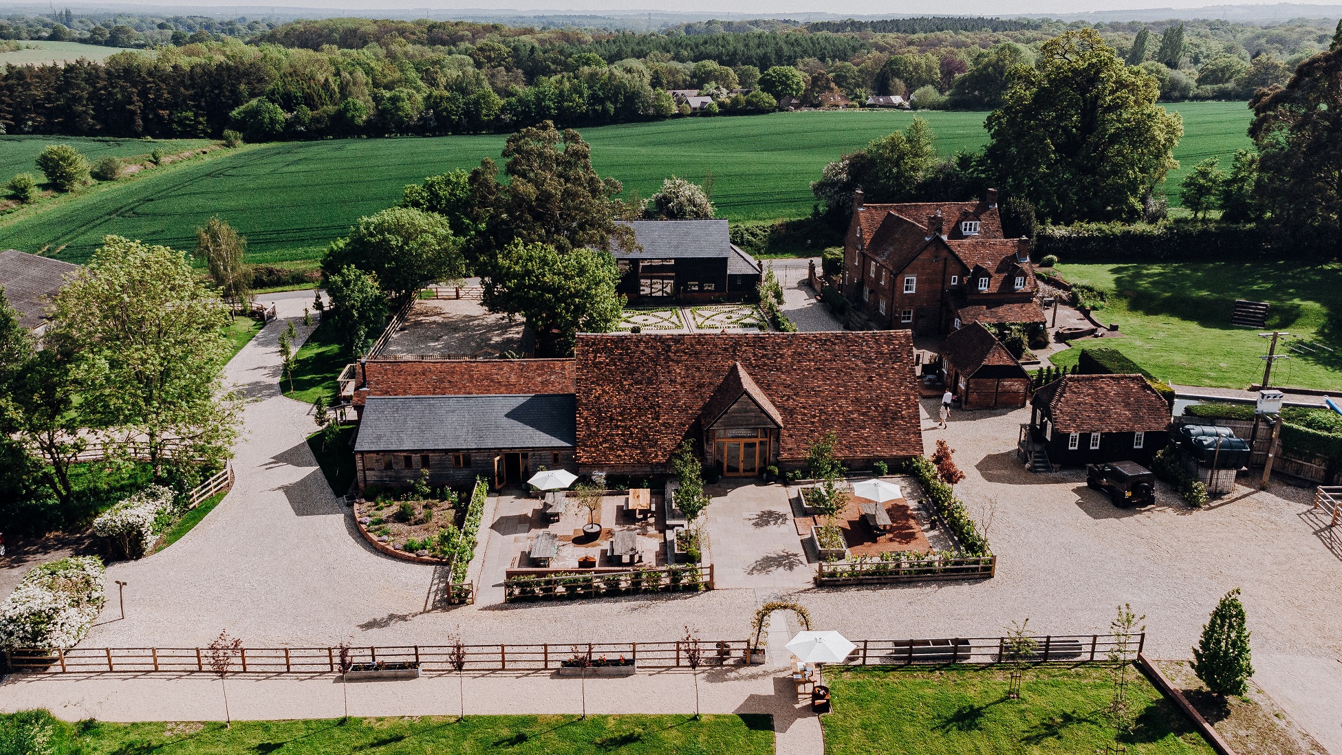 An aerial image of the farm and outbuildings.