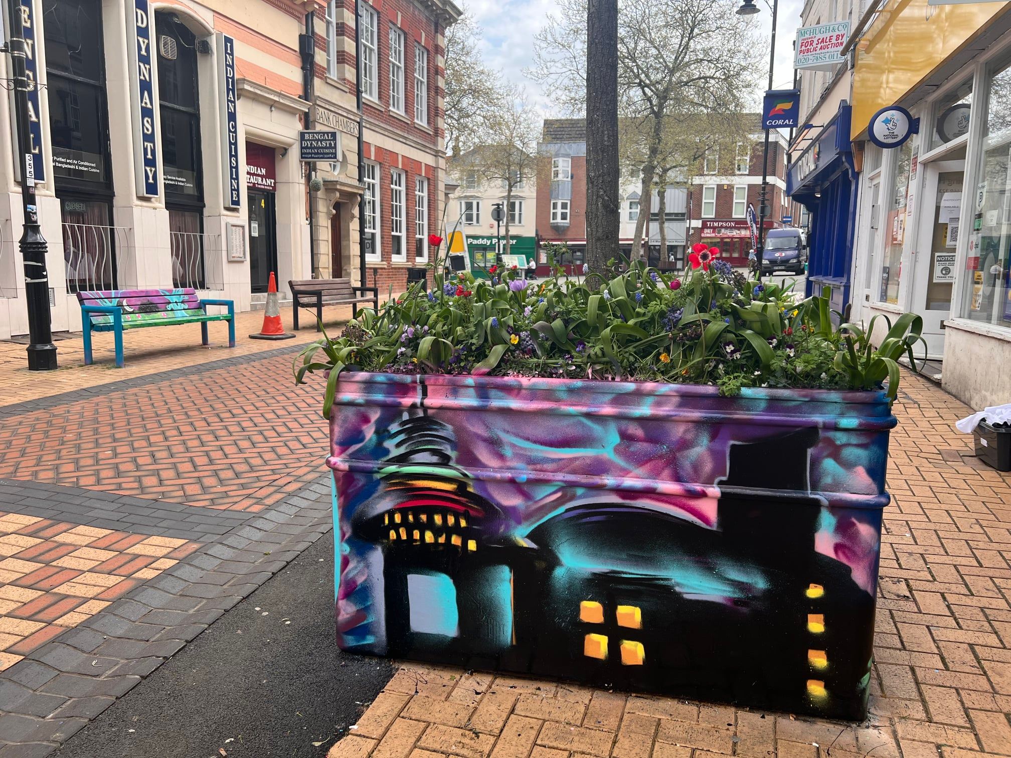 Willow the Wispa art on a planter at Winchester Road