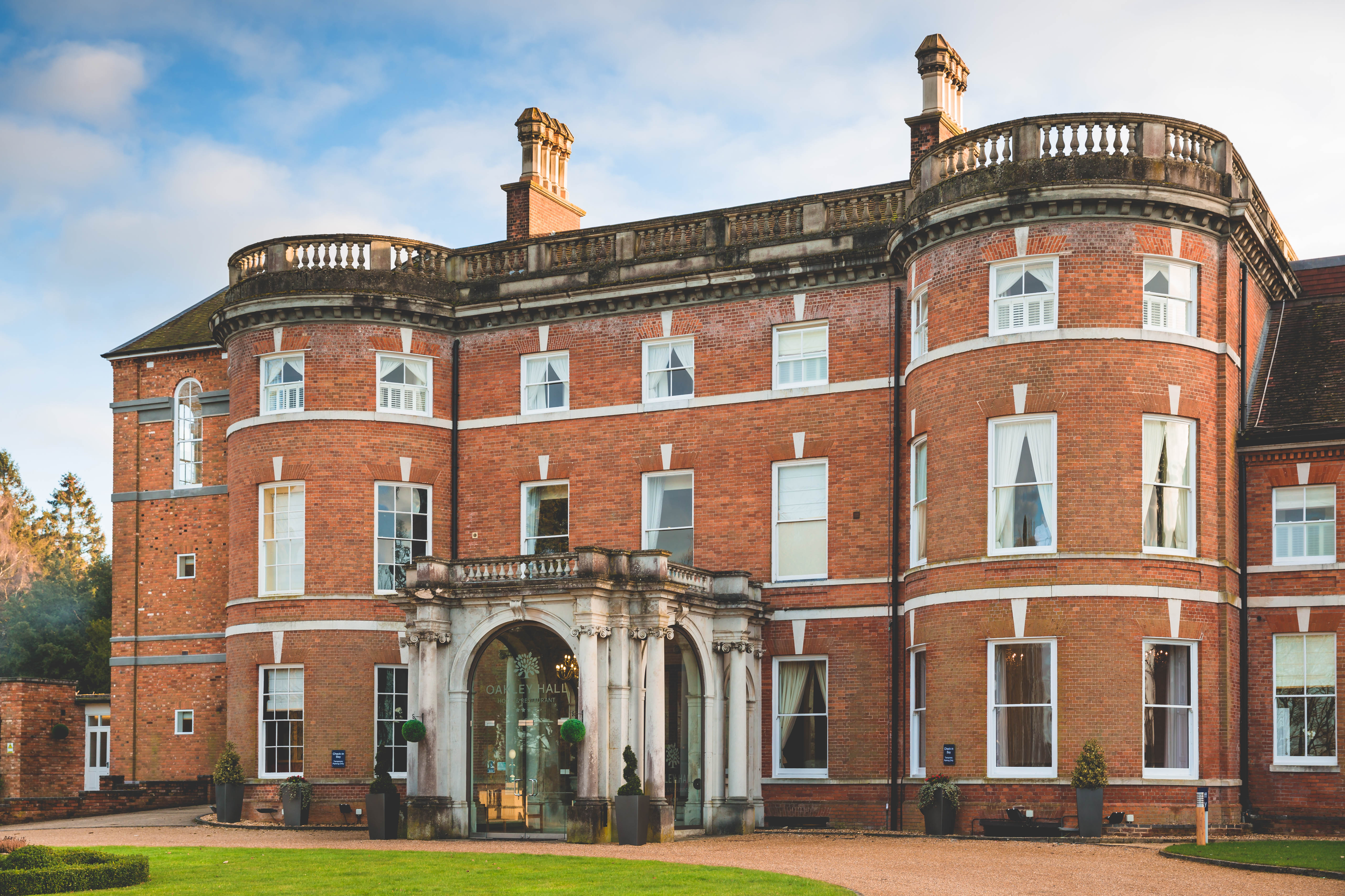 A red brick building with white windows.