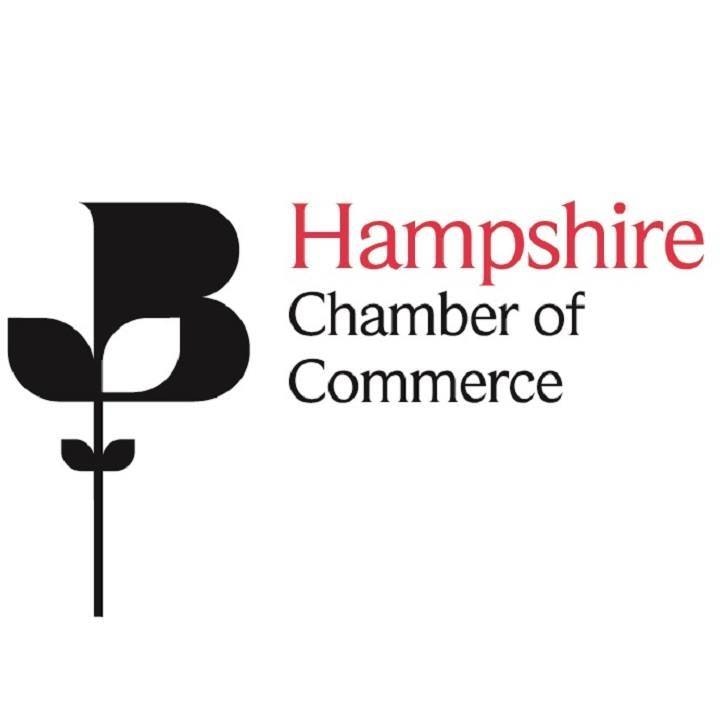 A black flower with the Hampshire Chamber of Commerce text