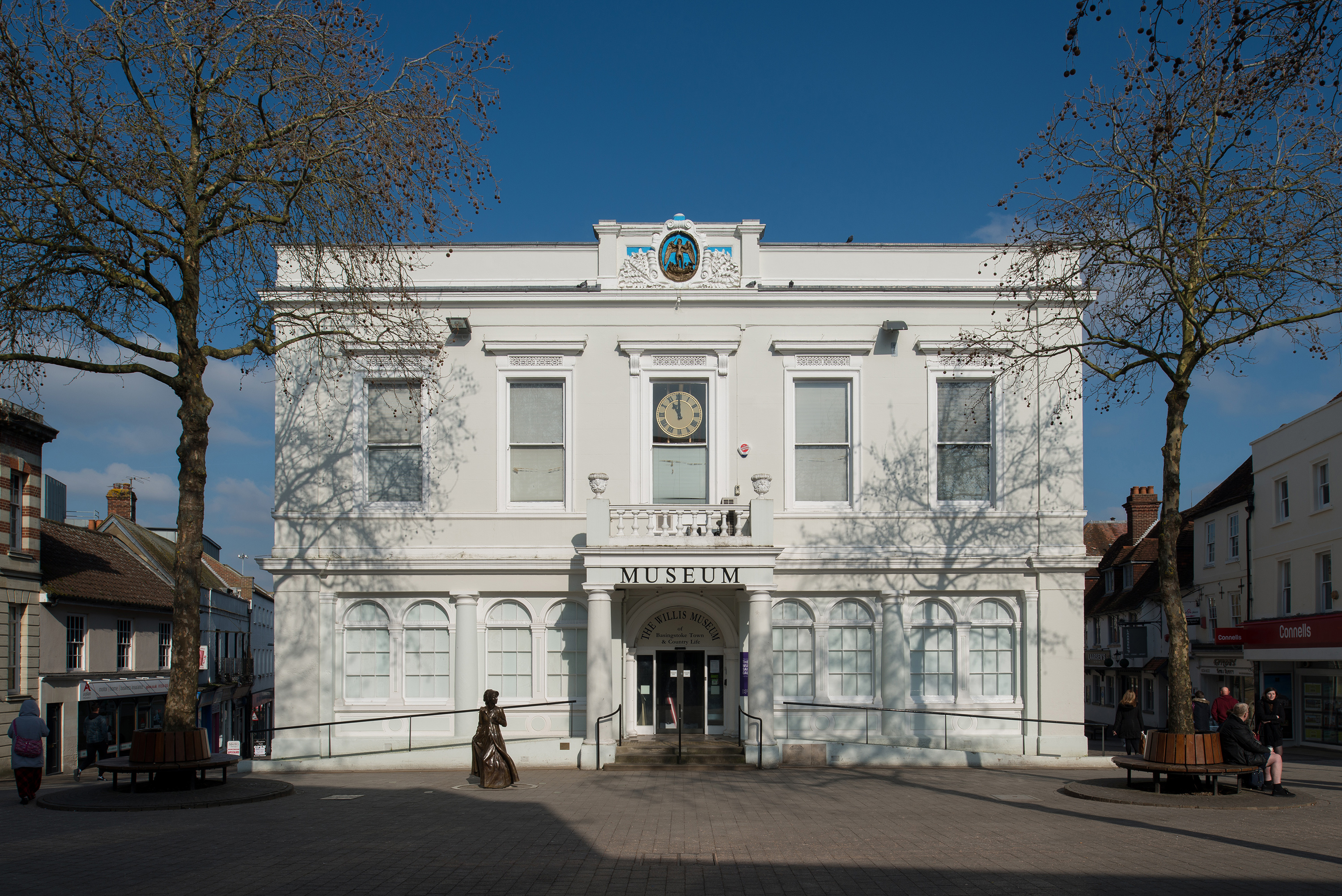 A two storey white building