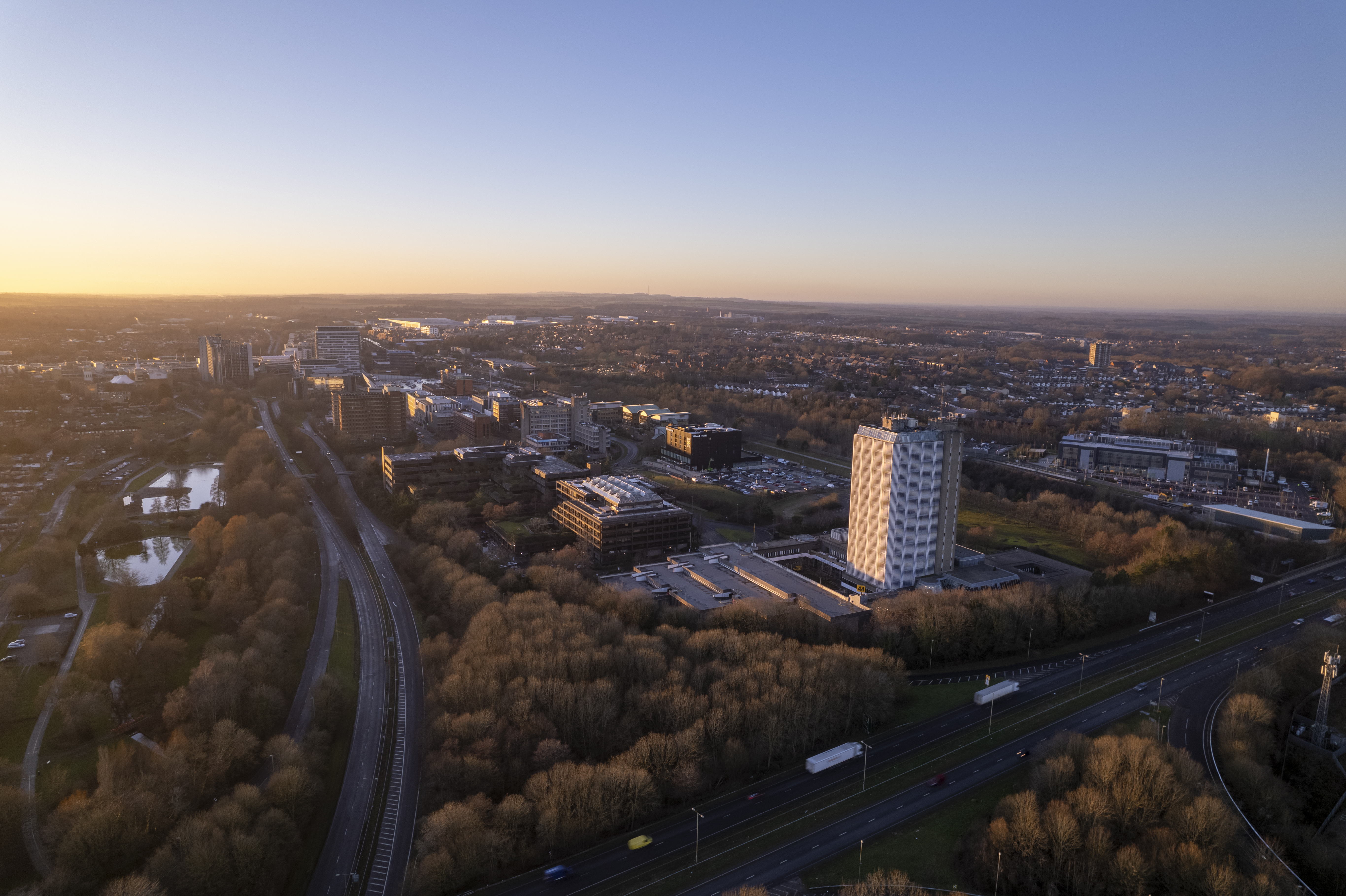 Basingstoke town centre with the sun low in the sky.