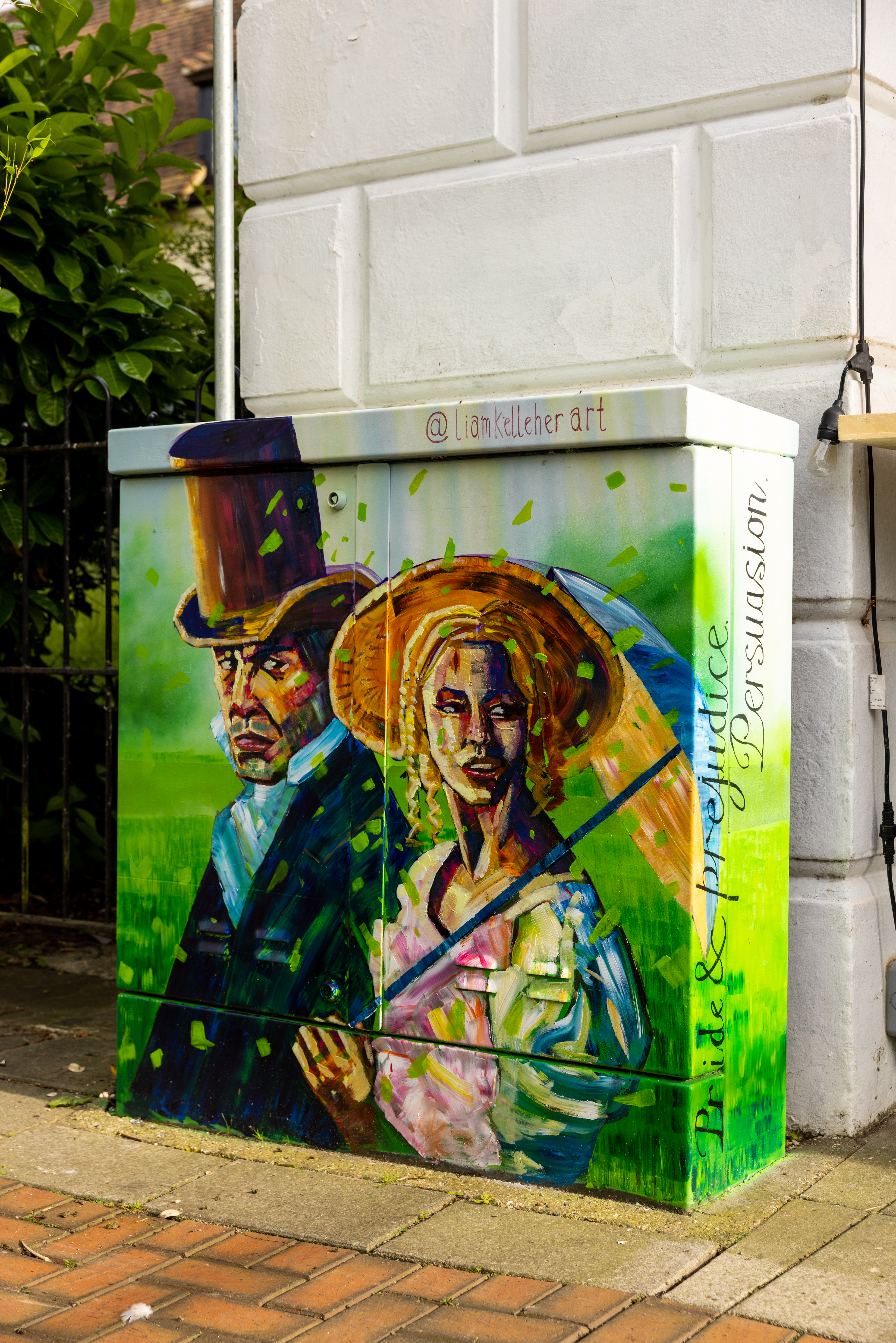 streetz alive telecom cabinet painted with two characters from Pride and Prejudice