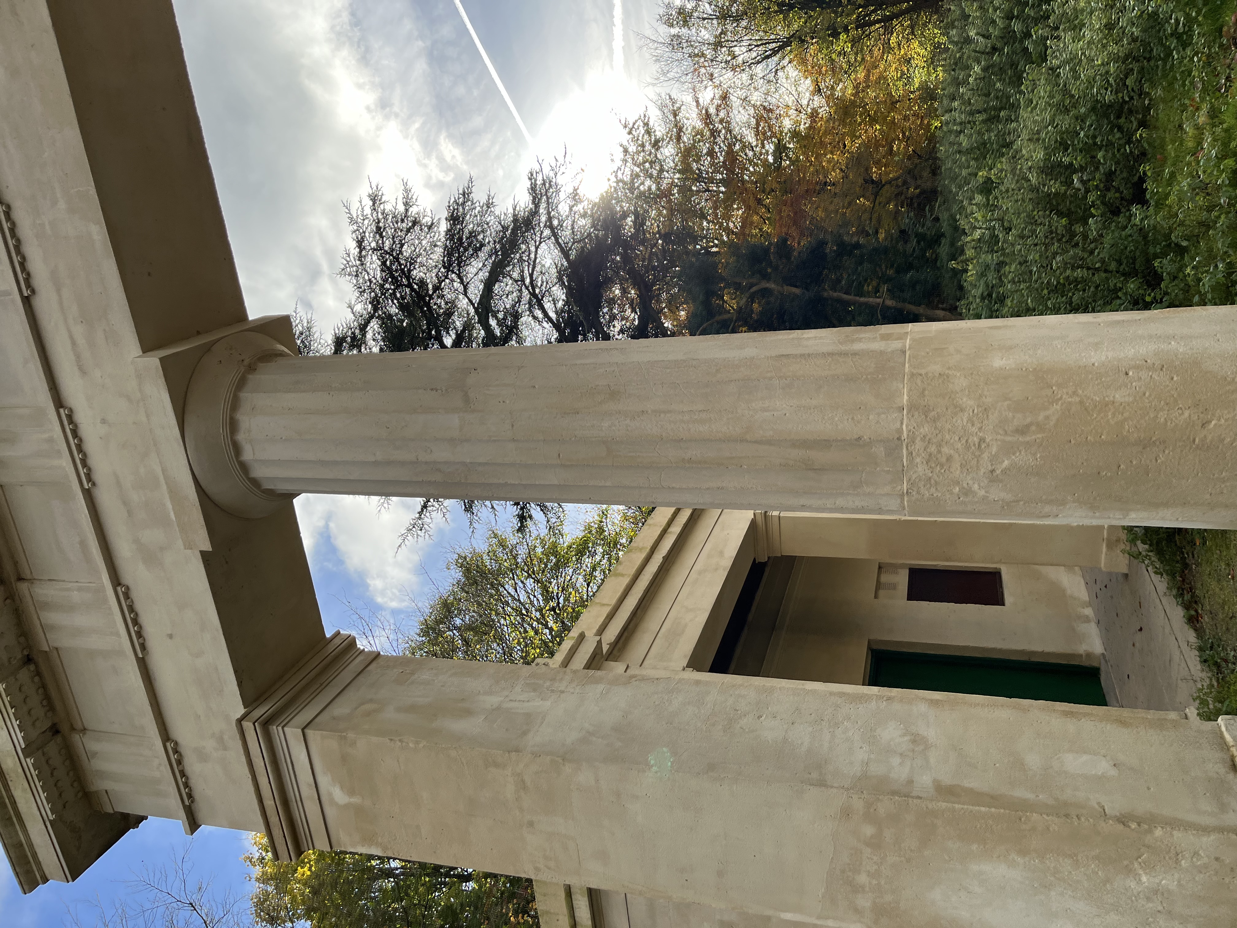 The arch at Crabtree plantation. The view is looking up at it and you can see the sun around it.